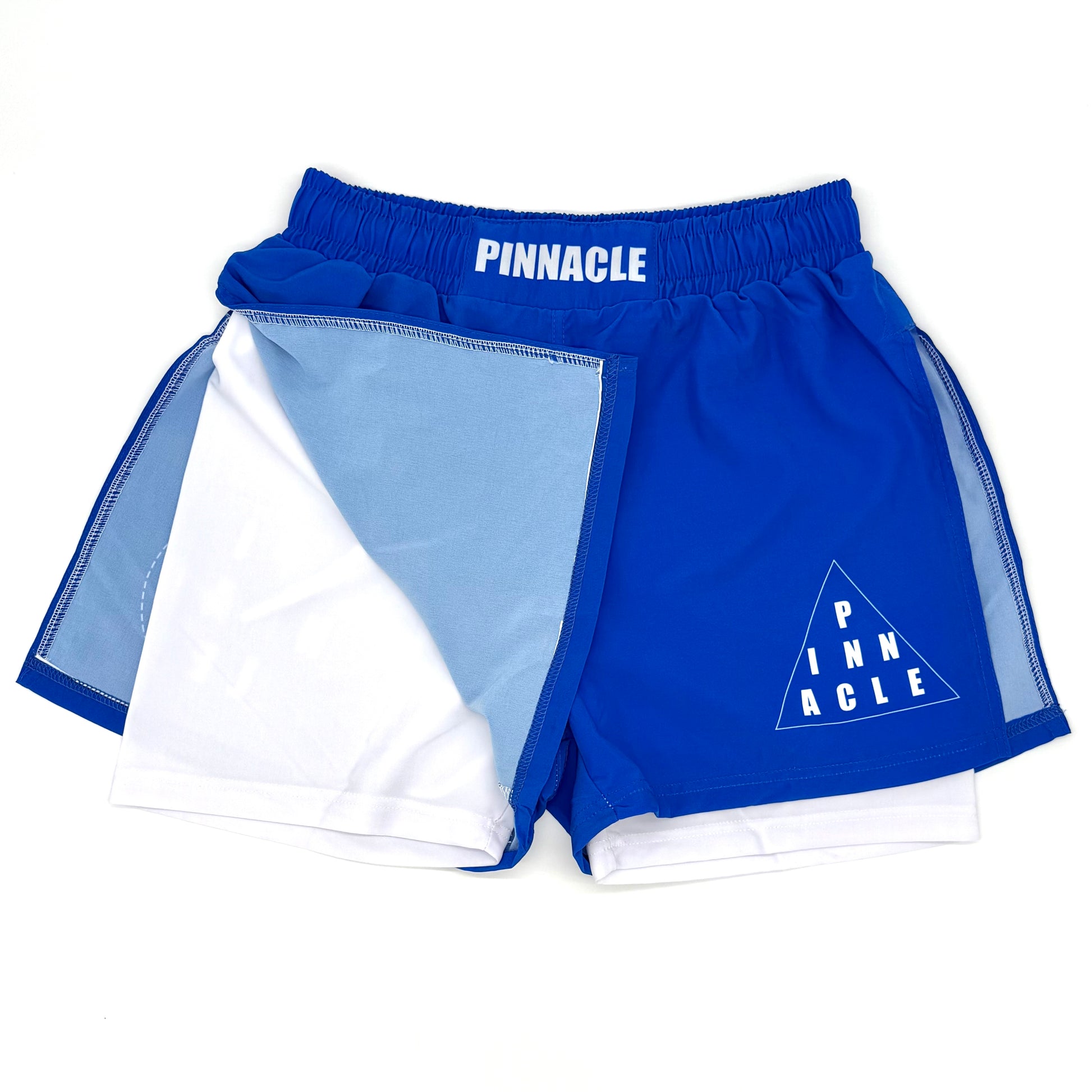 Blue high-slit gladiator MMA shorts front view with built-in compression shorts exposed